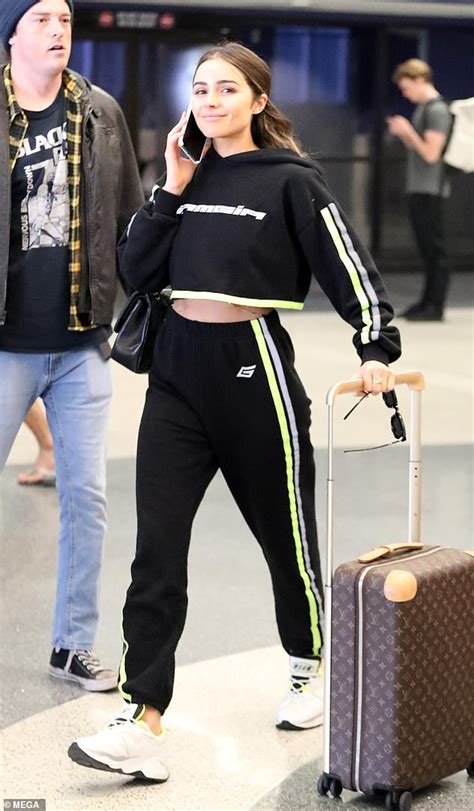 Olivia Culpo Goes Makeup Free With 10500 Accessories At Lax Daily Mail