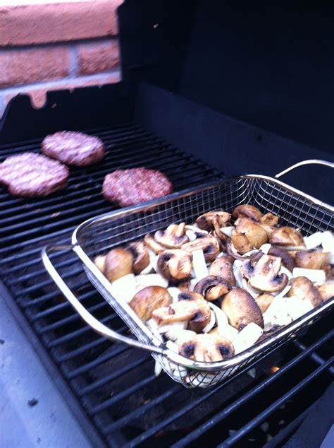 Pampered Chef Bbq Grill Basket In Action Grilling Some Mushrooms