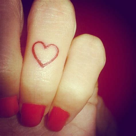 Small Heart Knuckle Finger Womans Tattoo Uncategorized