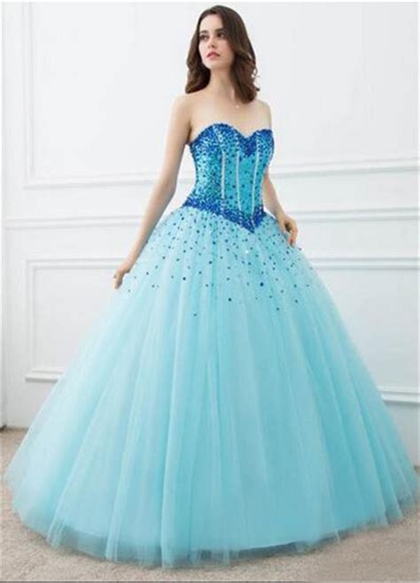 The dress of your dreams is just one click away! Ball Gown Strapless Light Blue Tulle Beaded Prom Dress ...