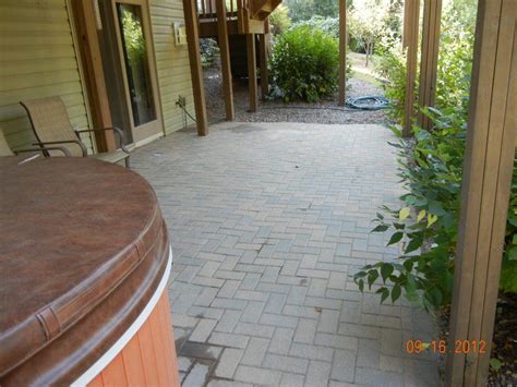 Do it yourself backyard pavers. How to lay pavers for a patio: Fixing a brick patio yourself | Brick patios, Brick paver patio ...