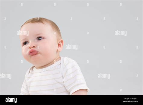 Baby Making Faces Stock Photo Alamy