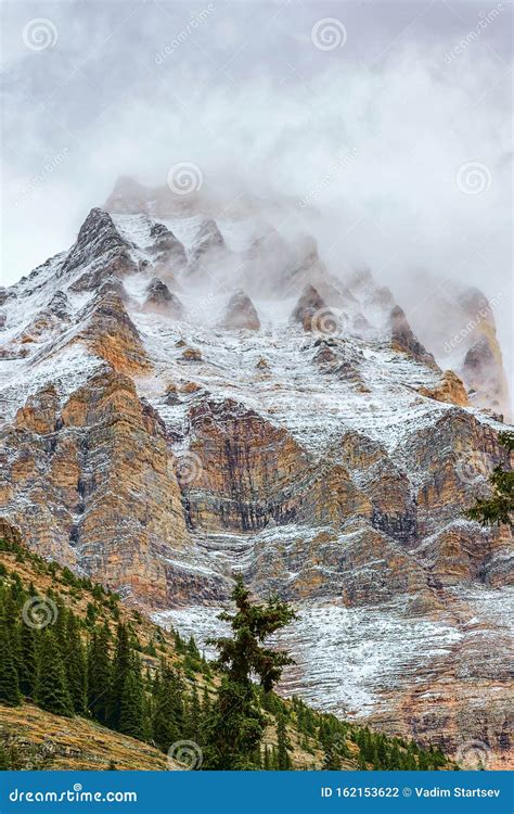 Mount Huber Covered By Snow And Cloudsyoho National Parkbritish