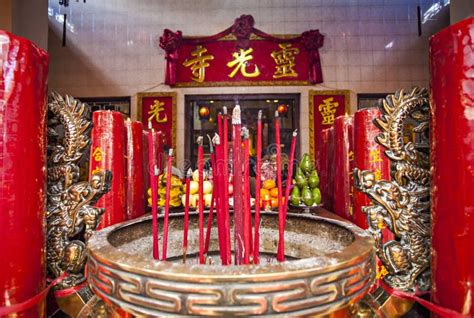 Large Red Candles Are Lit At The Temples To Celebrate Chinese New Year