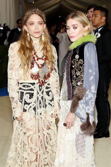 I was watching them so much while growing up. Mary-Kate and Ashley Olsen at MET Gala in New York 05/01 ...