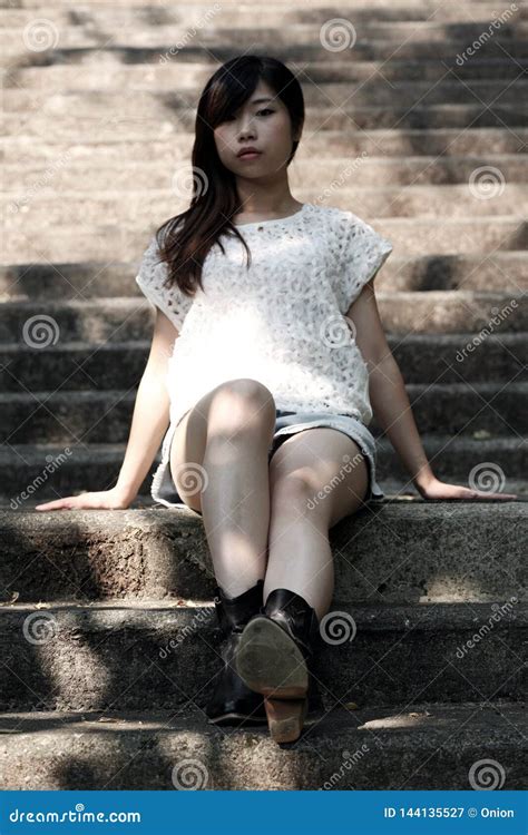 Beautiful Asian Woman Sitting On Cement Steps Stock Image Image Of