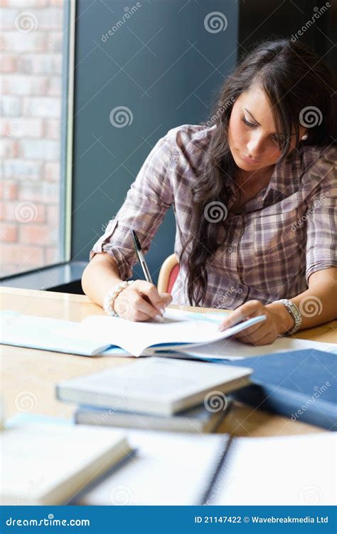 Portrait Of A Beautiful Student Writing An Essay Stock Photo Image Of