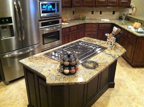 This can be tricky on a kitchen island since there are no walls in. Kitchen island gas cooktop | Island cooktop | Pinterest ...