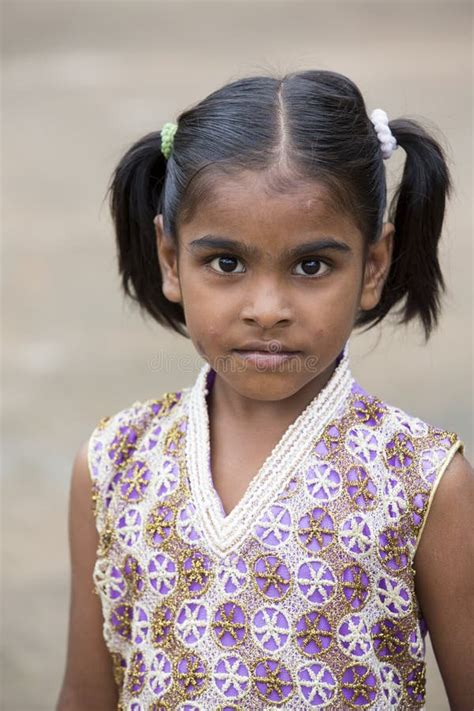 An Unidentified Poor Girl In A Small Village Looking At The Camera Editorial Photography Image