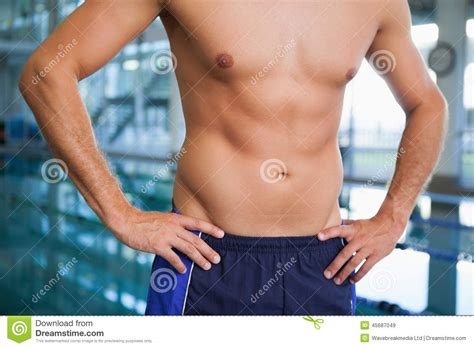Mid Section Of A Shirtless Muscular Man In White Towel Royalty Free