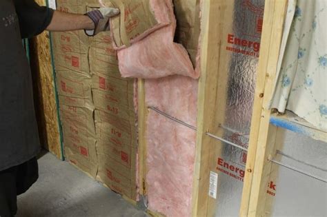 Osb is a good sheathing material for garage walls. How To - Sheathing Garage Walls With Plywood and Insulate ...