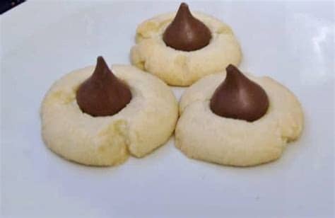 This can take time and you want to get the chocolates on the. Shortbread Hershey Kiss Cookies Recipe
