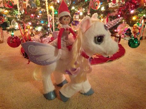 An Elf Riding On The Back Of A White Horse In Front Of A Christmas Tree
