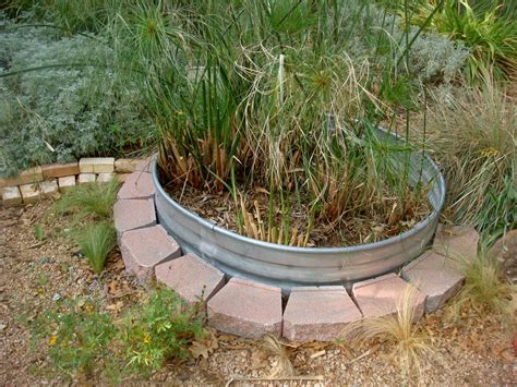 The natural stone creates a beautiful border, which also acts as a retaining wall. 23 Magnificient Menards Landscape Edging - Home, Family ...