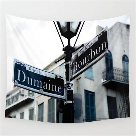 Dumaine And Bourbon Street Sign In New Orleans French Quarter Wall