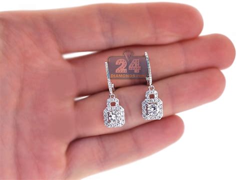 Fluid by name and by nature, these earrings are delicate enough to sway as you move and can be worn in three different ways: Womens Diamond Drop Halo Earrings 18K White Gold 1.65 ct