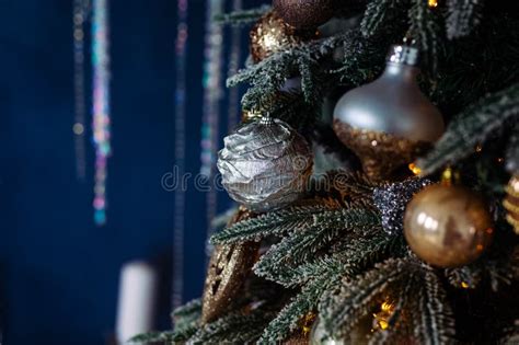 Silver And Gold Decorations Foil Ball On Christmas Tree Stock Photo