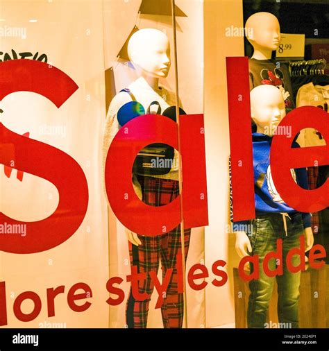 London Uk Shop Window Stock Sale Sign To Encourage Customers Of A High