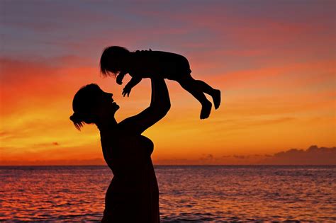 Mother And Child Sunset Silhouette Photograph By Vince Cavataio