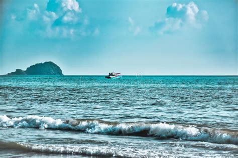 Speed Boat On The Waves Of The Azure Andaman Sea Under The Blue Sky
