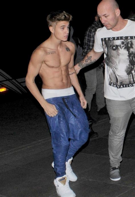 discovering news l a justin bieber parties shirtless in london on his birthday with ellapaige