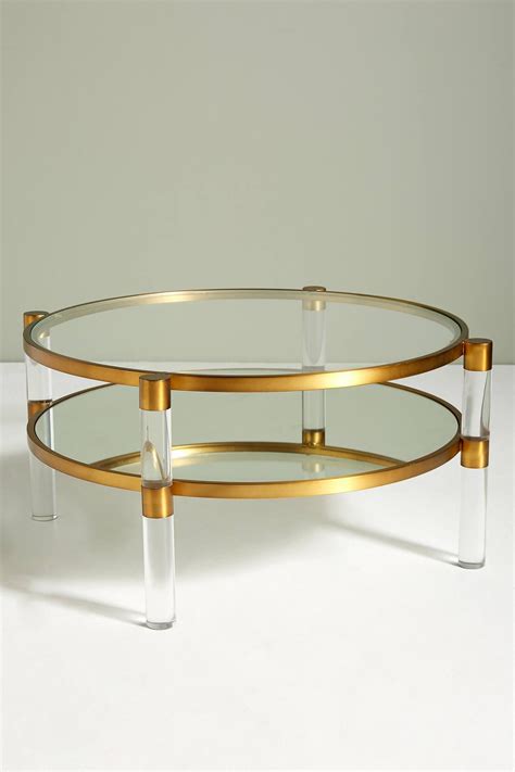 Shop for round coffee tables at cb2. Oscarine Lucite Mirrored Round Coffee Table | Mirrored ...