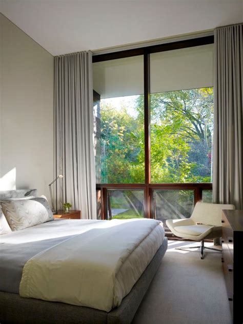 Many modern spaces often forego window treatments, but light and airy styles are ideal bedroom curtain ideas for these types of homes. curtains as window Treatment