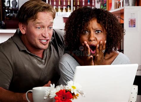 Mixed Race Couple In Coffee House With Laptop Comp Stock Photo Image