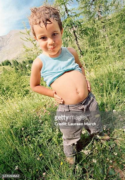 Kid Showing Belly Photos And Premium High Res Pictures Getty Images