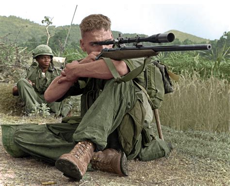 Marine Lance Corporal Dalton Gunderson Checking The Area For Viet Cong
