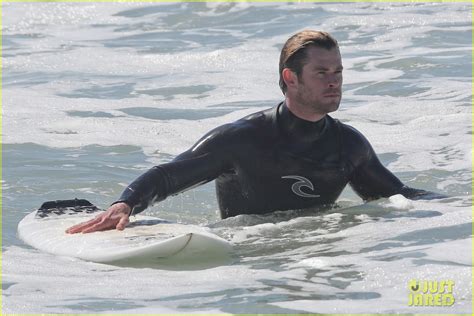 Chris Hemsworths Muscles Bulge Out Of His Tight Wetsuit Photo 3068887 Chris Hemsworth Photos