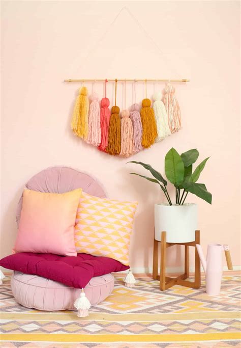 Easy decoupaged personalized wall decor | 11 magnolia lane. DIY Giant Tassel Wall Hanging - A Beautiful Mess