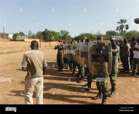 Burkinabé Gendarmerie Practice Movement In Crowd Control Formations