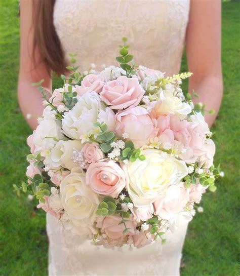 Pretty Baby Pink Bouquets And Buttonholes With A Lovely Mix Of Ivory