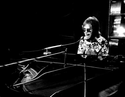 Hey do you know of anyone who has the sheet music to elton john's social disease? Elton John 1970 #4 Photograph by Chris Walter