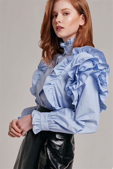 Details This Button Up Top Channels Vintage Elegance With Its High
