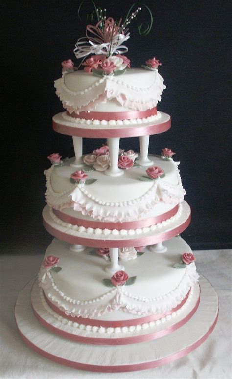 Fold these into the creamed mixture using a metal spoon. Traditional Wedding Cakes With Pillars | Traditional ...
