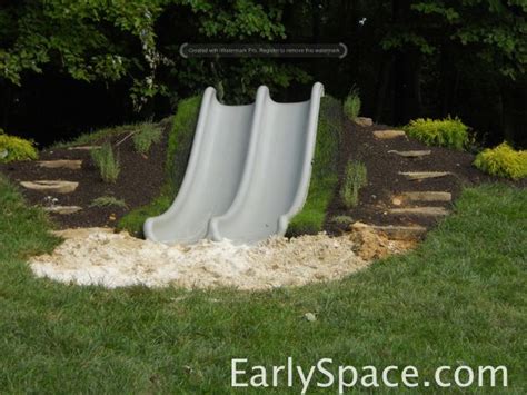 Slide In A Hillside With Stone Steps Backyard Playground Backyard
