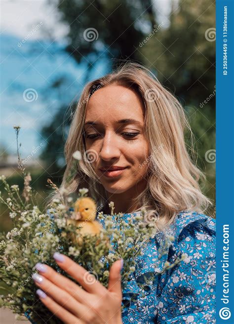 Beautiful Girl Holding Wildflowers And Duckling In Her Hands Stock Image Image Of Love