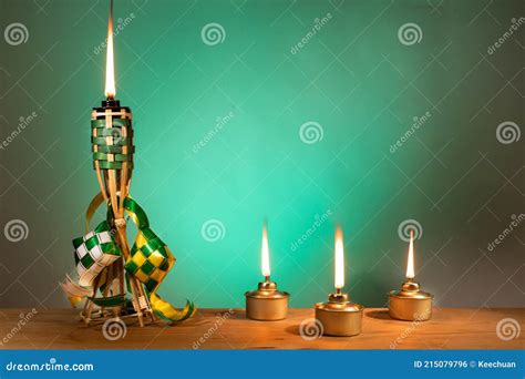 Conceptual Traditional Malay Torch And Lamp And Decorative Ketupat