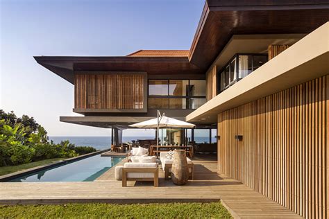 Beach house plans, coastal house plans. Coastal Home with Tropical Modern Architecture and ...