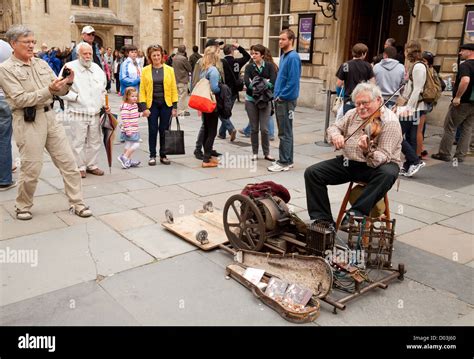 An Old Senior Man Busking In The Street With His Violin Bath Somerset