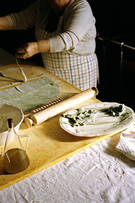A Woman Is Making Something On A Table