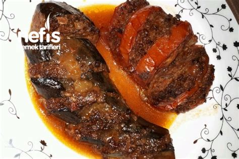 4 adet patlıcan, 400 gr kıyma, 1 adet orta boy soğan, 1 tutam maydanoz, 2 yemek kaşığı galeta unu, tuz, karabiber, kimyon, 1 yemek kaşığı domates salçası, 1 su bardağı su. Kazan Kebabı - Nefis Yemek Tarifleri - #3872408