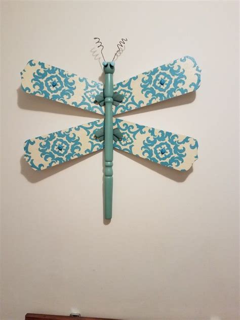 Cream And Jade Dragonfly Made From Fan Blades And A Table