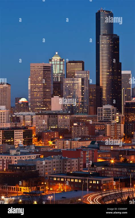 Seattle City Skyline At Night Dominated By Columbia Tower As Seen