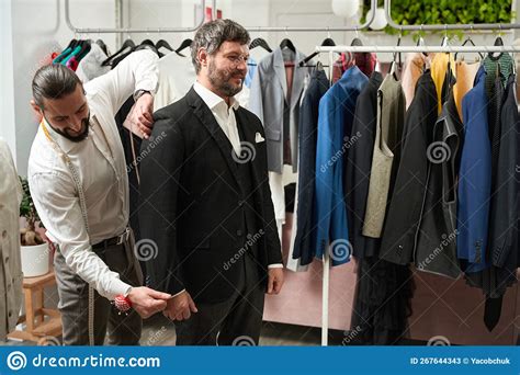 Tailor Fitting Trying On New Suit On His Client Stock Image Image Of