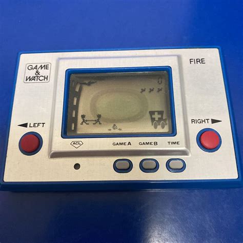 Nintendo Game And Watch Fire 1980 Rc 04 Silver Vintage Handheld Console