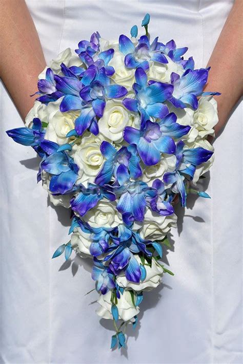 Maybe you would like to learn more about one of these? Stunning Galaxy Blue Orchid and Ivory Rose Cascading ...