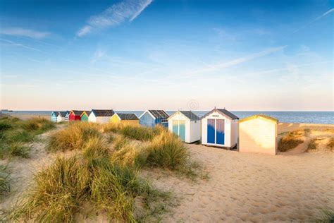 Colourfull Beach Huts In The Sand Dunes At Southwold Stock Image